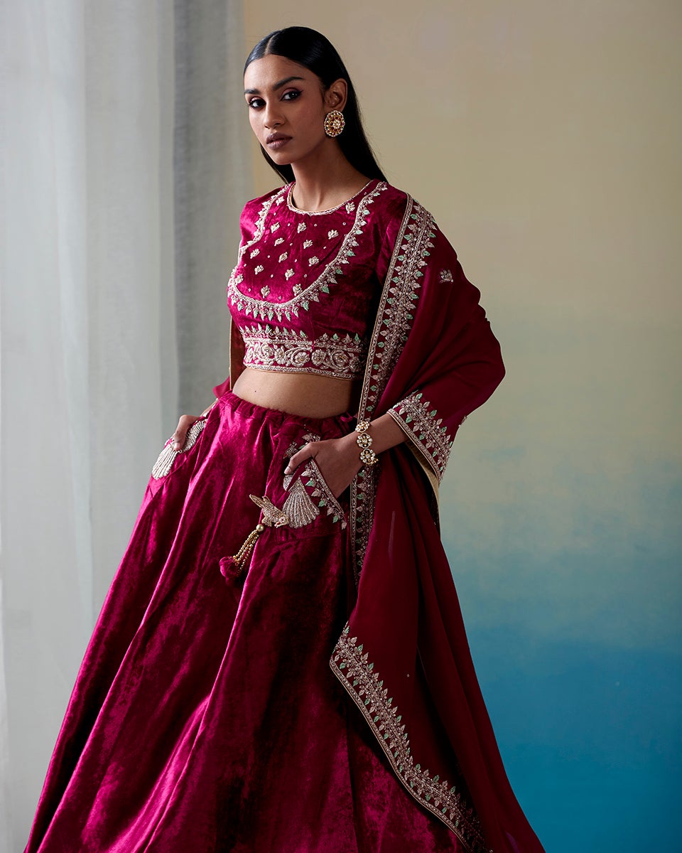 Fuchsia_Pure_Velvet_Hand_Embroidered_Zardozi_Lehenga_with_Velvet_Blouse_and_Handwoven_Organza_Dupatta_WeaverStory_01