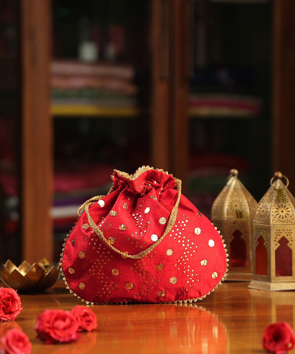 Red_Raw_Silk_Hand_Embroidered_Potli_With_Big_And_Small_Sequin_Dots_All_Over_WeaverStory_02