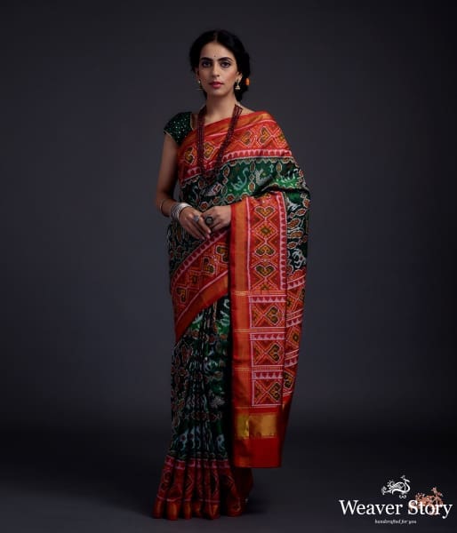 Pure_silk_Gujarat_Patola_saree_in_emerald_green_and_red_with_horse,_swan_and_fish_motifs_WeaverStory_02