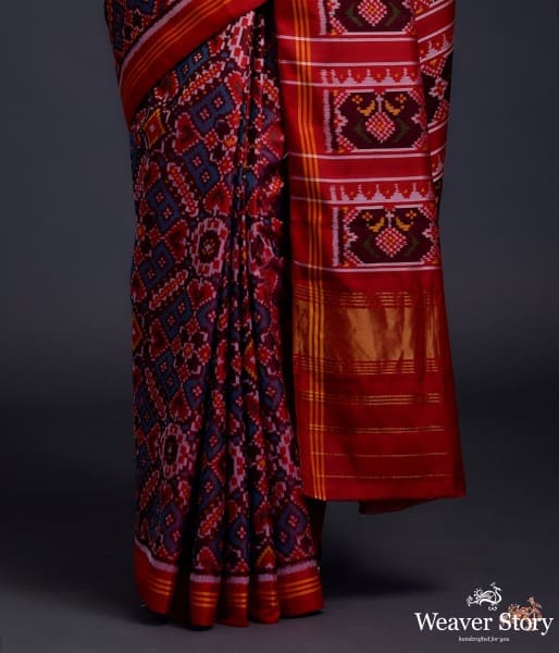 Pure_silk_Gujarat_Patola_saree_in_blue_and_red_dual_tone_in_the_famous_paan_bhaat_weave_WeaverStory_04