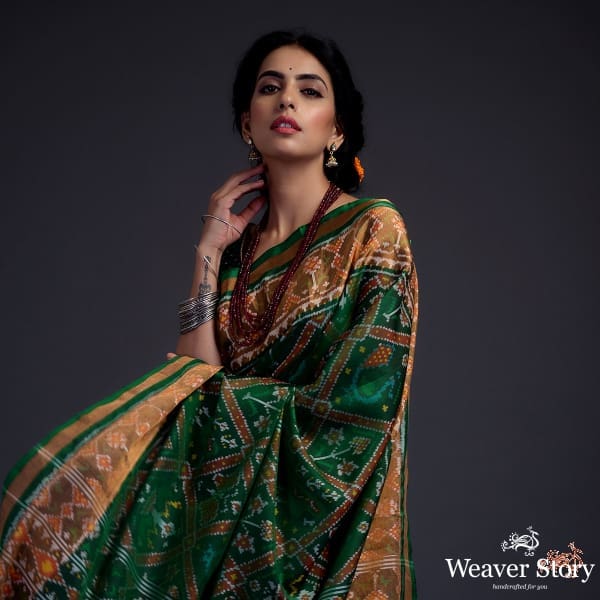 Emerald_green_single_ikat_patola_saree_with_tissue_border_WeaverStory_01