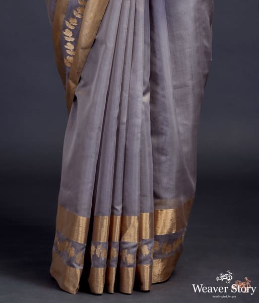Grey_chanderi_silk_saree_with_gold_zari_floral_motifs_on_pallu_and_broad_gold_border_WeaverStory_04