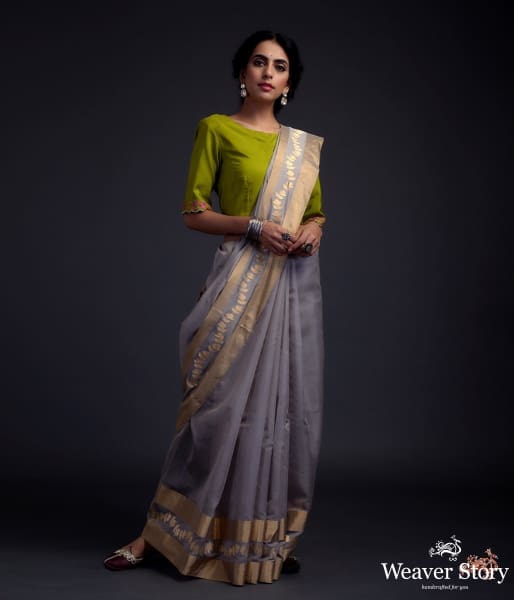 Grey_chanderi_silk_saree_with_gold_zari_floral_motifs_on_pallu_and_broad_gold_border_WeaverStory_02