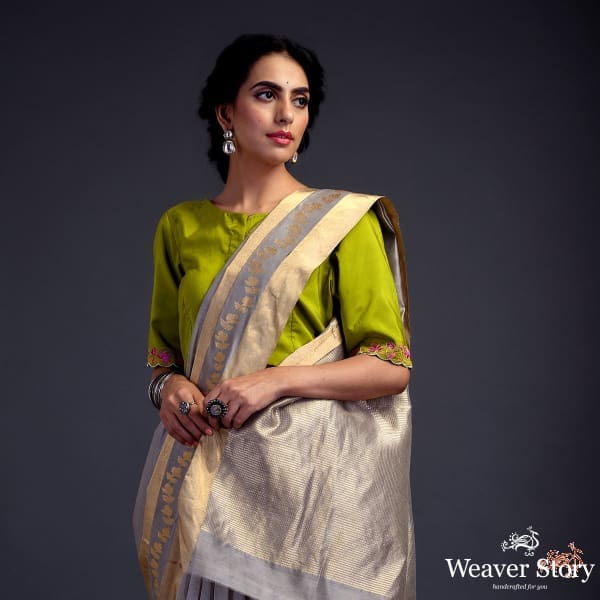 Grey_chanderi_silk_saree_with_gold_zari_floral_motifs_on_pallu_and_broad_gold_border_WeaverStory_01