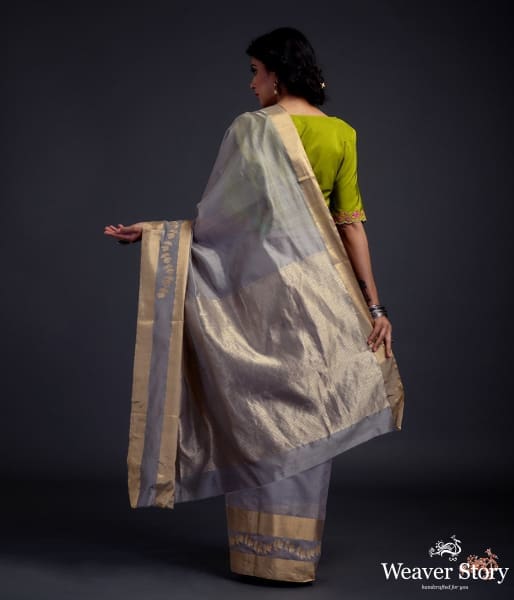 Grey_chanderi_silk_saree_with_gold_zari_floral_motifs_on_pallu_and_broad_gold_border_WeaverStory_03