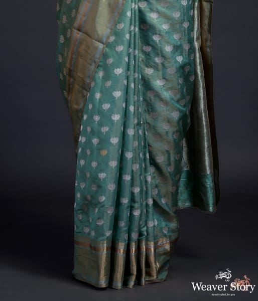 Green_chanderi_silk_saree_with_floral_motifs_and_a_tissue_weft_WeaverStory_04