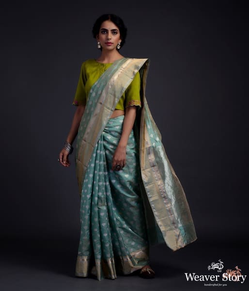Green_chanderi_silk_saree_with_floral_motifs_and_a_tissue_weft_WeaverStory_02