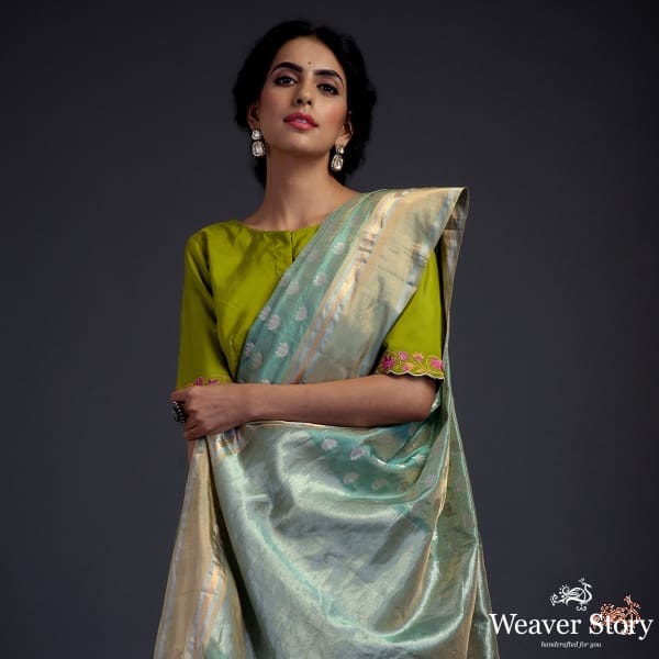 Green_chanderi_silk_saree_with_floral_motifs_and_a_tissue_weft_WeaverStory_01