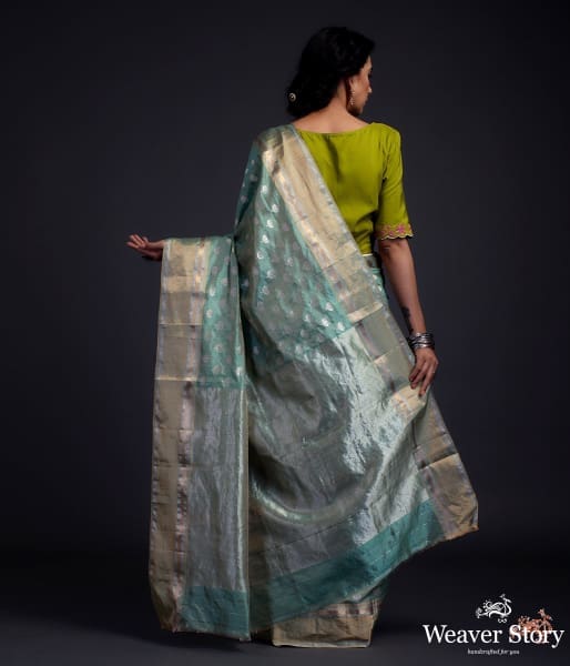Green_chanderi_silk_saree_with_floral_motifs_and_a_tissue_weft_WeaverStory_03
