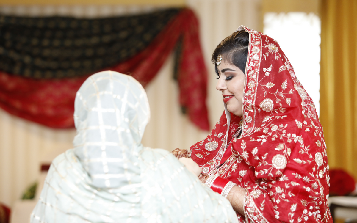 A Mesmerizing WeaverStory Bride Nehal in Red Suit on her Wedding Day