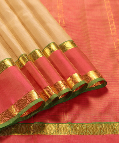 Handloom_Beige_Pure_Silk_Kanjivaram_Saree_With_Green_And_Pink_Border_WeaverStory_01