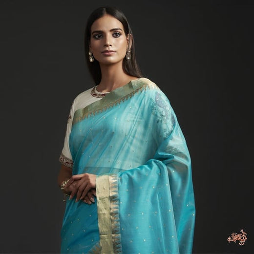 Aqua Blue all over Zari Booti Saree with temple Border
