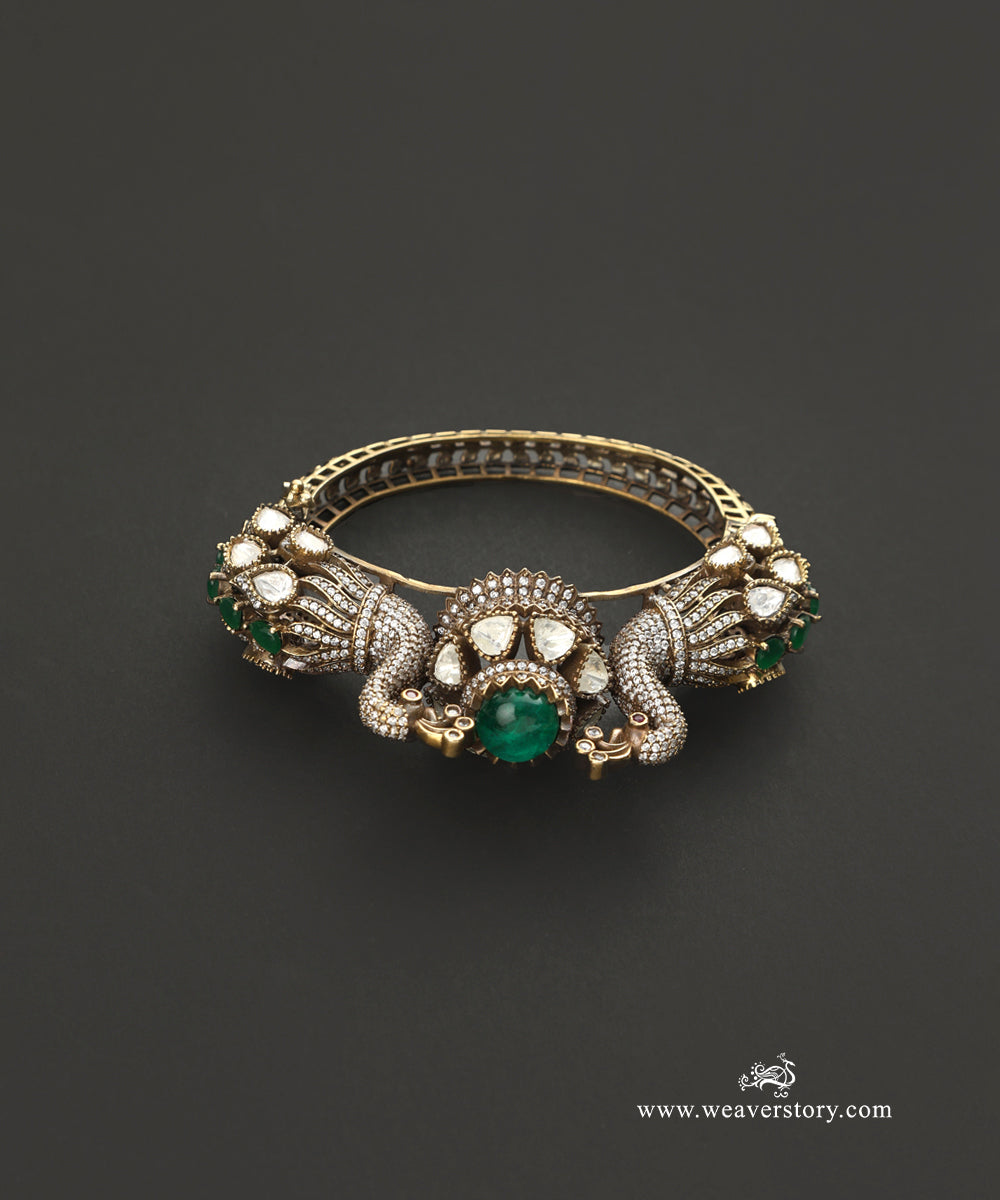 Arunima_Handcrafted_Bangle_With_Peacock_Motifs_And_Semi_Precious_Stones_WeaverStory_03