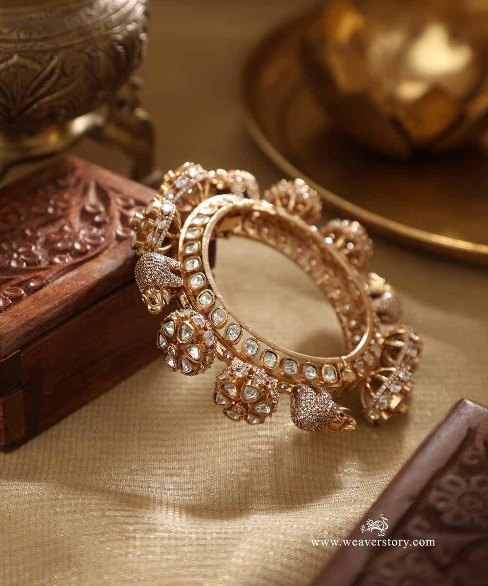 Baghyawati_Handcrafted_Bangle_With_Elephant_Motifs_And_Semi_Precious_Stones_WeaverStory_01