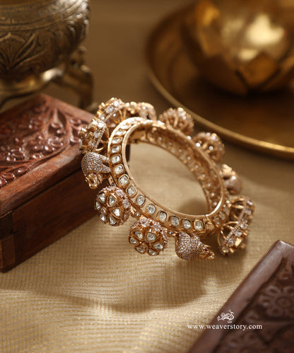 Baghyawati_Handcrafted_Bangle_With_Elephant_Motifs_And_Semi_Precious_Stones_WeaverStory_01