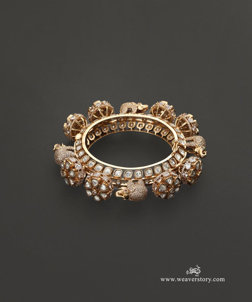 Baghyawati_Handcrafted_Bangle_With_Elephant_Motifs_And_Semi_Precious_Stones_WeaverStory_02