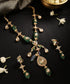 Mayur_Angan_Kundan_Necklace_Set_with_Green_Stones_&_Peacock_Motif_WeaverStory_01
