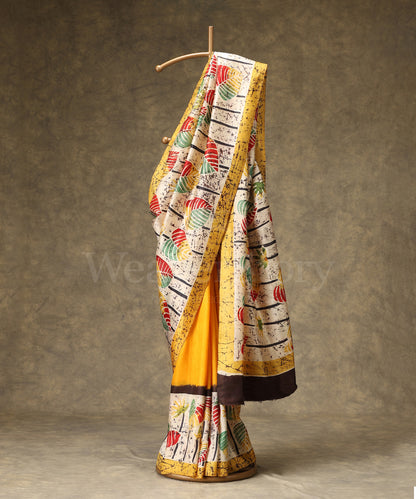 Handloom Yellow And Offwhite Pure Mulberry Silk Hand Batik Saree With Leaf Motifs