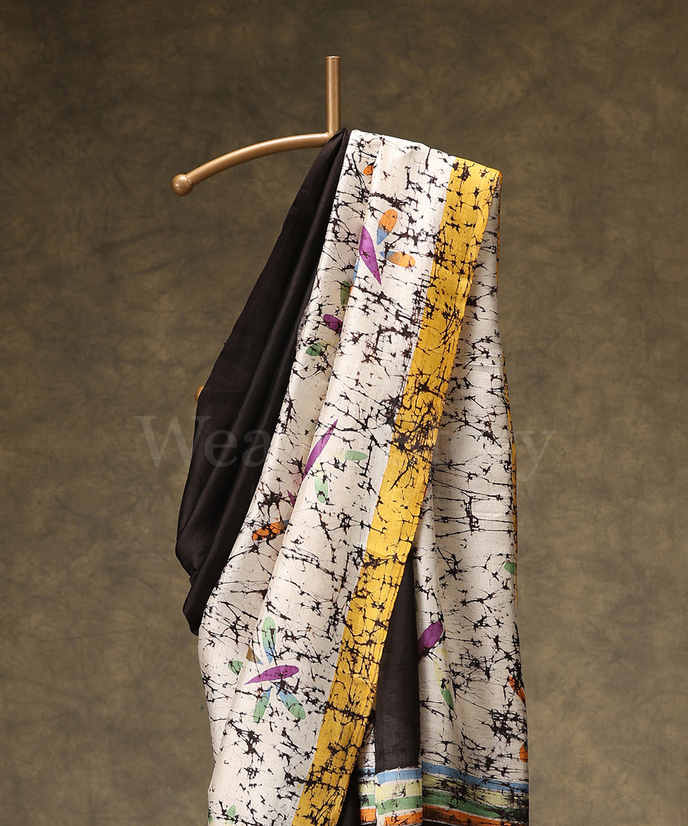 Black_And_Offwhite_Handloom_Hand_Batik_Mulberry_Silk_Saree_With_Yellow_Border_WeaverStory_02