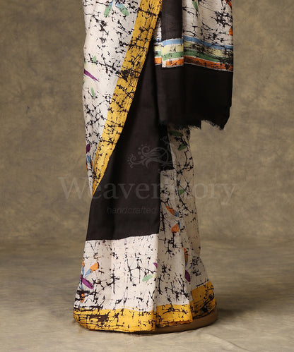 Black_And_Offwhite_Handloom_Hand_Batik_Mulberry_Silk_Saree_With_Yellow_Border_WeaverStory_03