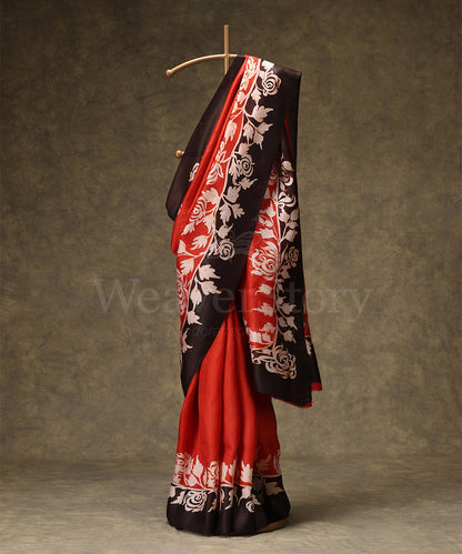 Black_And_Orange_Handloom_Hand_Batik_Mulberry_Silk_Saree_With_Floral_Border_WeaverStory_01