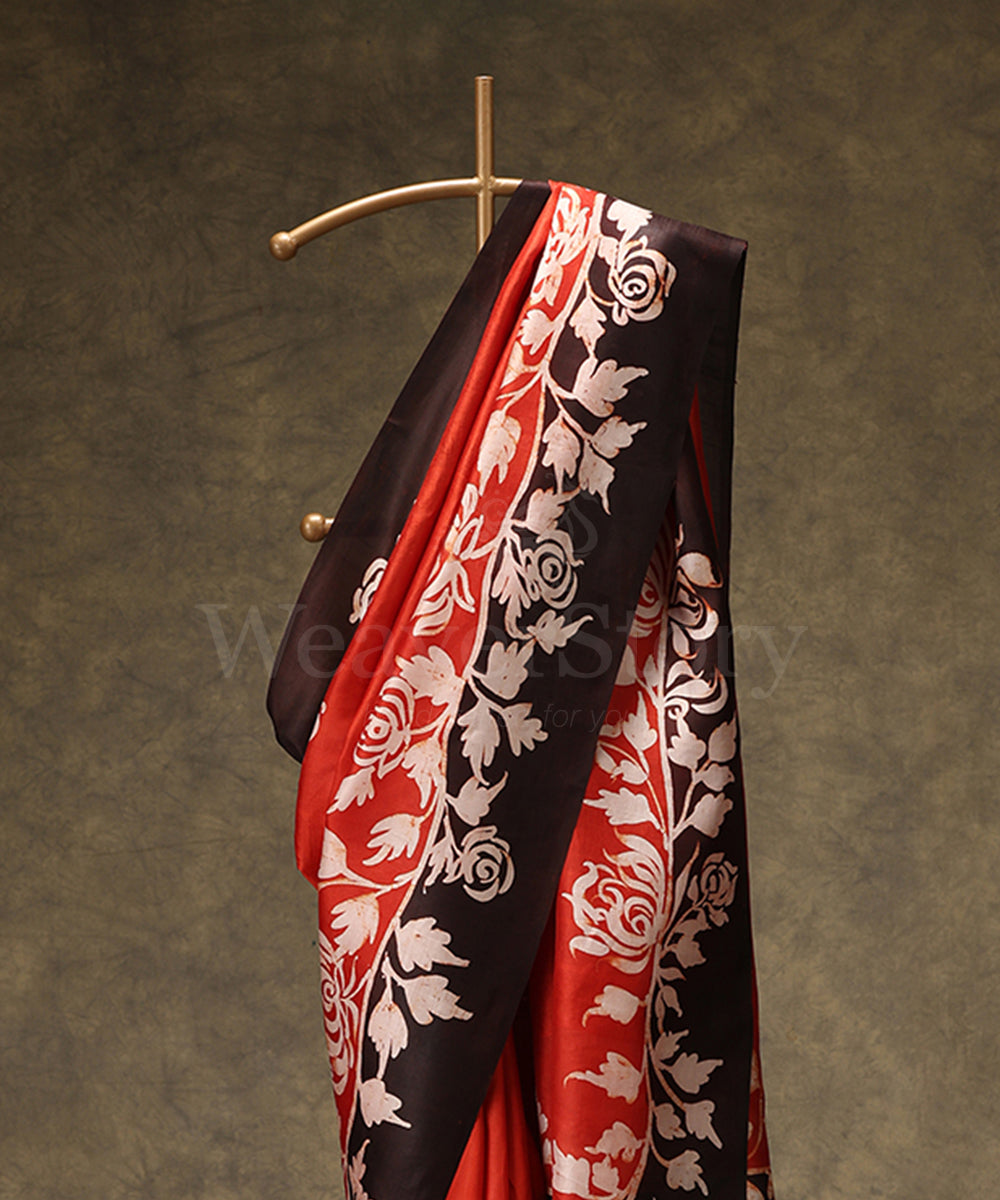 Black_And_Orange_Handloom_Hand_Batik_Mulberry_Silk_Saree_With_Floral_Border_WeaverStory_02