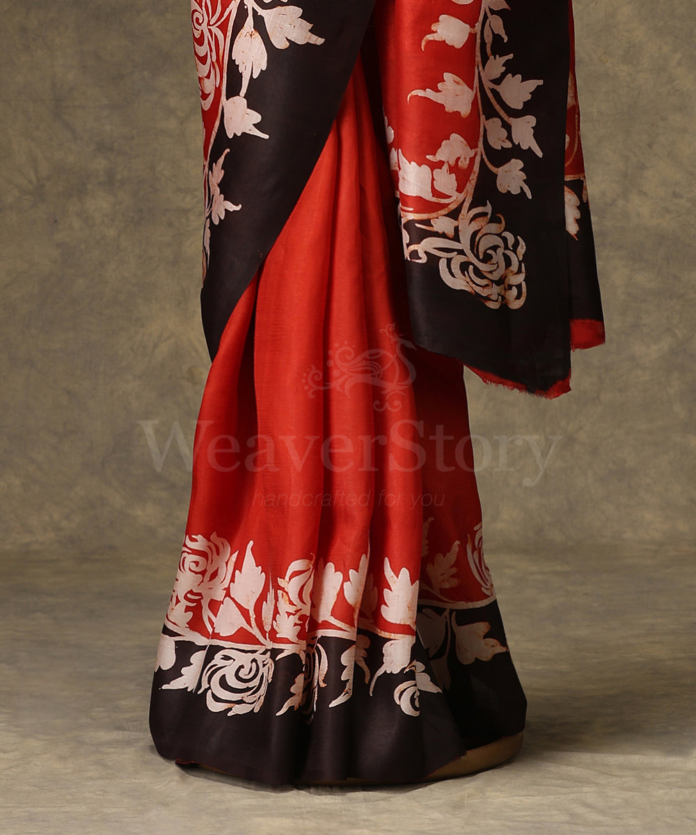 Black_And_Orange_Handloom_Hand_Batik_Mulberry_Silk_Saree_With_Floral_Border_WeaverStory_03