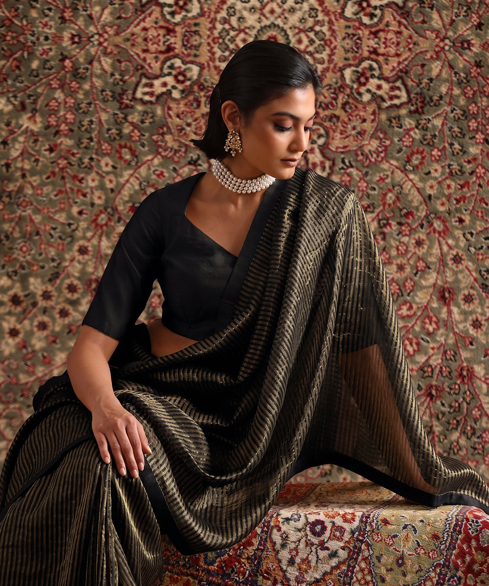 Solstice Black Striped Tissue Saree With Chanderi Finishing from Antara by WeaverStory