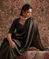 Solstice Black Striped Tissue Saree With Chanderi Finishing from Antara by WeaverStory