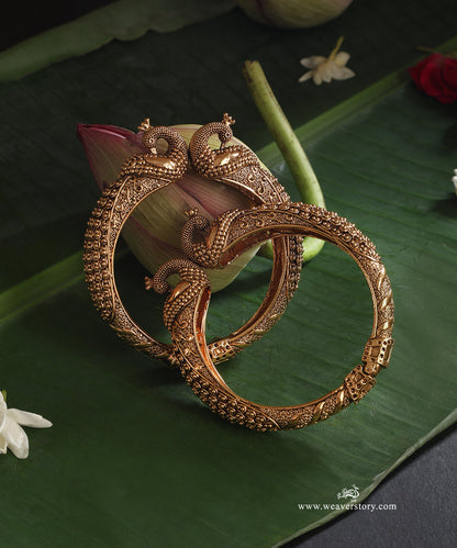 Aleena_Handcrafted_Gold_Plated_Alloy_Bangles_Set_WeaverStory_01