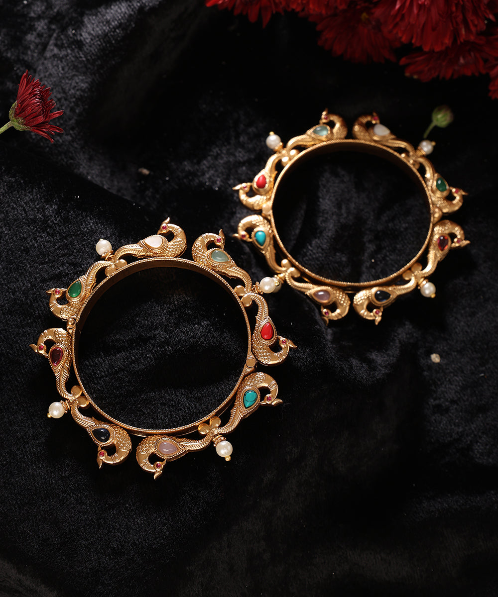 Manara_Handcrafted_Alloy_Gold_Plated_Bangles_With_Peacock_Motif_And_Semi_Precious_Stones_WeaverStory_01