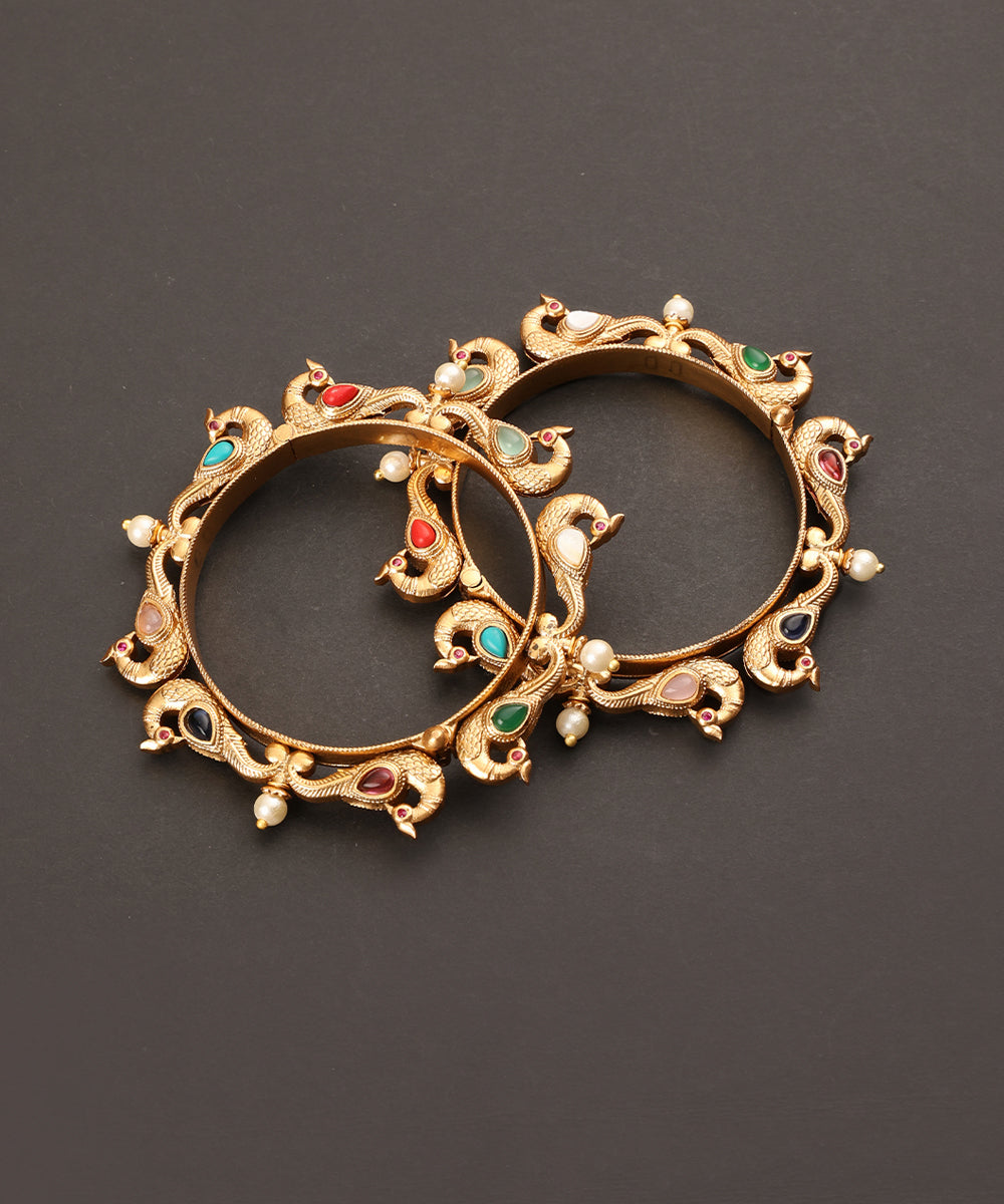 Manara_Handcrafted_Alloy_Gold_Plated_Bangles_With_Peacock_Motif_And_Semi_Precious_Stones_WeaverStory_02