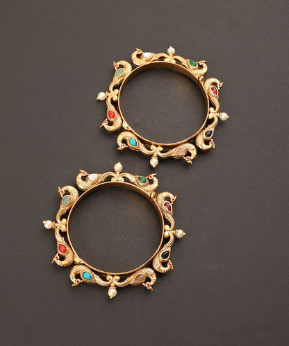 Manara_Handcrafted_Alloy_Gold_Plated_Bangles_With_Peacock_Motif_And_Semi_Precious_Stones_WeaverStory_03