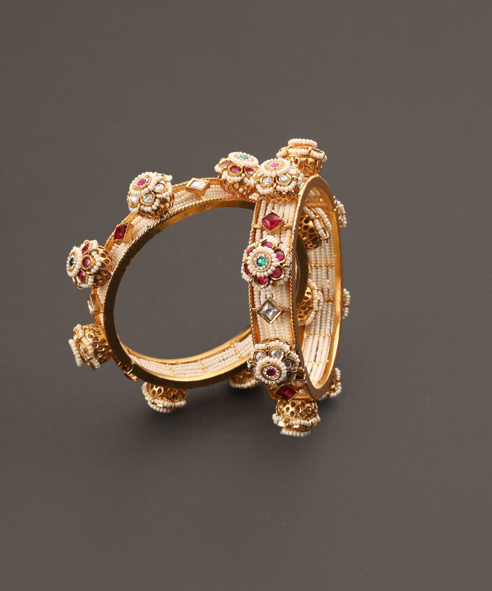 Anaya_Handcrafted_Alloy_Gold_Plated_Bangles_With_Semi_Precious_Stones_And_Pearls_In_Floral_Motifs_WeaverStory_02