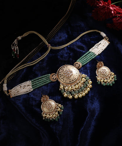 Saloni_Handcrafted_Alloy_Gold_Plated_Necklace_Set_With_Semi_Precious_Stones_And_Multistrand_Pearl_Ladi_WeaverStory_01