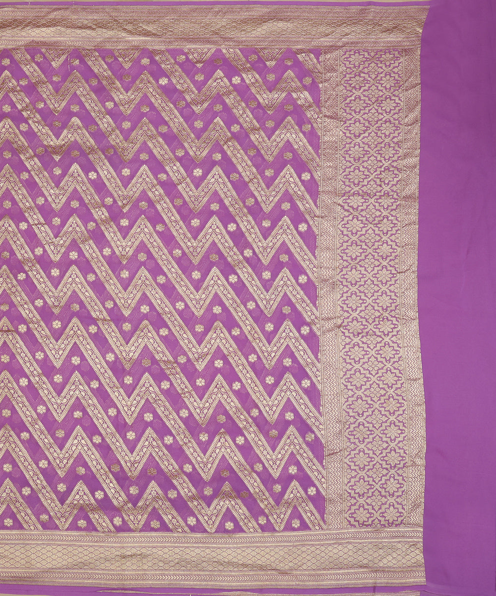 Full view of lavender handloom Banarasi georgette dupatta with gold-toned zari chevrons, scattered bootis and a floral border.