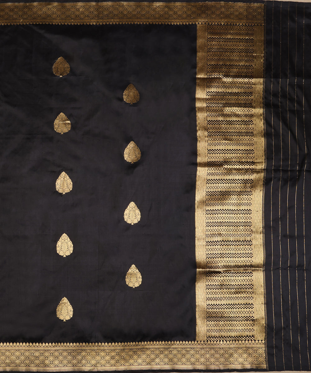 Full view of black handloom Katan silk dupatta featuring Kadhwa gold zari bootis, diamond-patterned palla and striped ends.