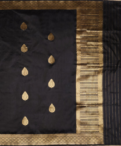 Full view of black handloom Katan silk dupatta featuring Kadhwa gold zari bootis, diamond-patterned palla and striped ends.