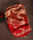 Red and gold pure Kora tissue Banarasi dupatta with fine woven bands, floral vine end panels and leaf-patterned borders.