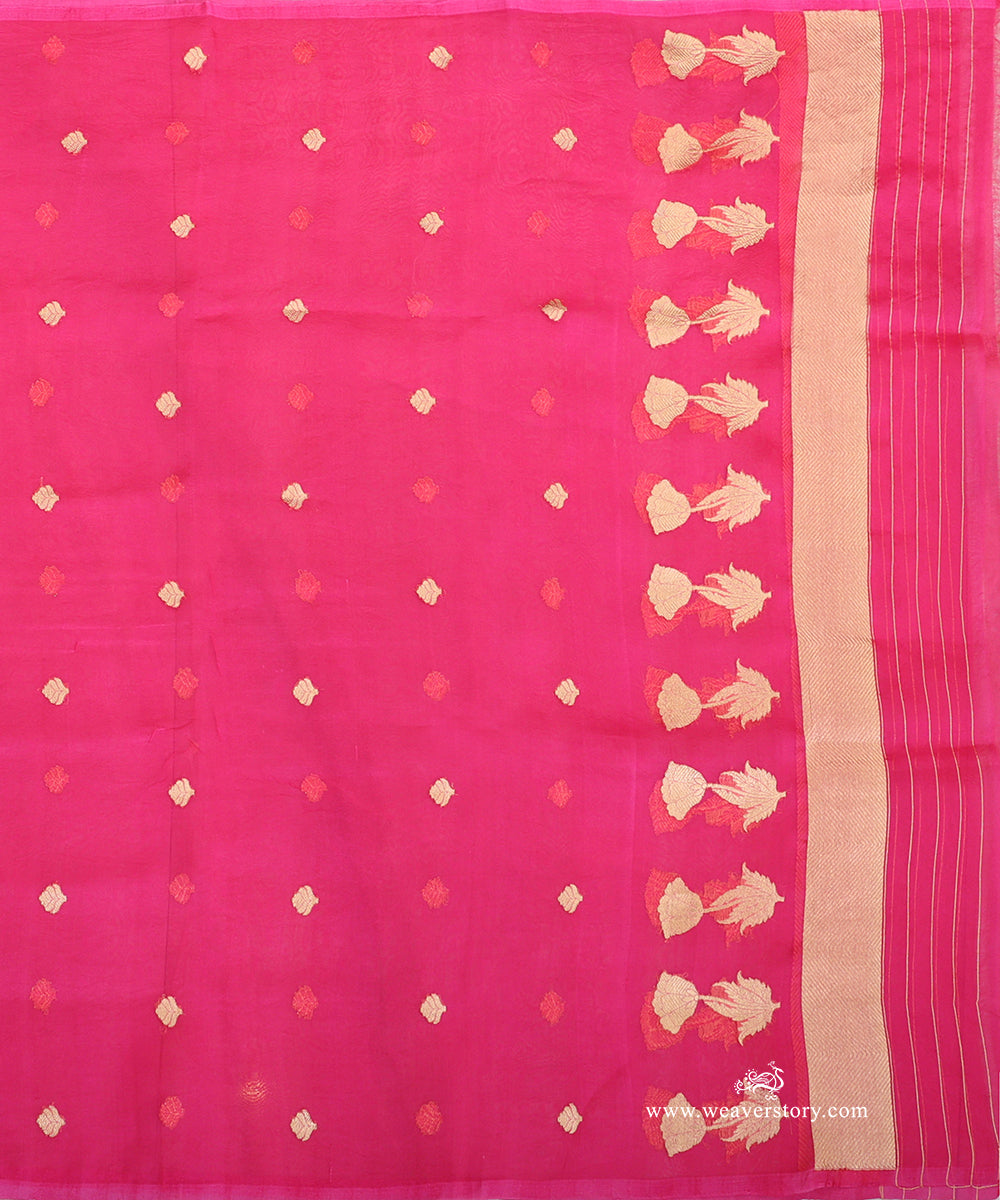 Hot pink Kora silk dupatta showing scattered floral bootis, a row of lotus motifs with leaves and gold-toned chevron ends with fine stripes.