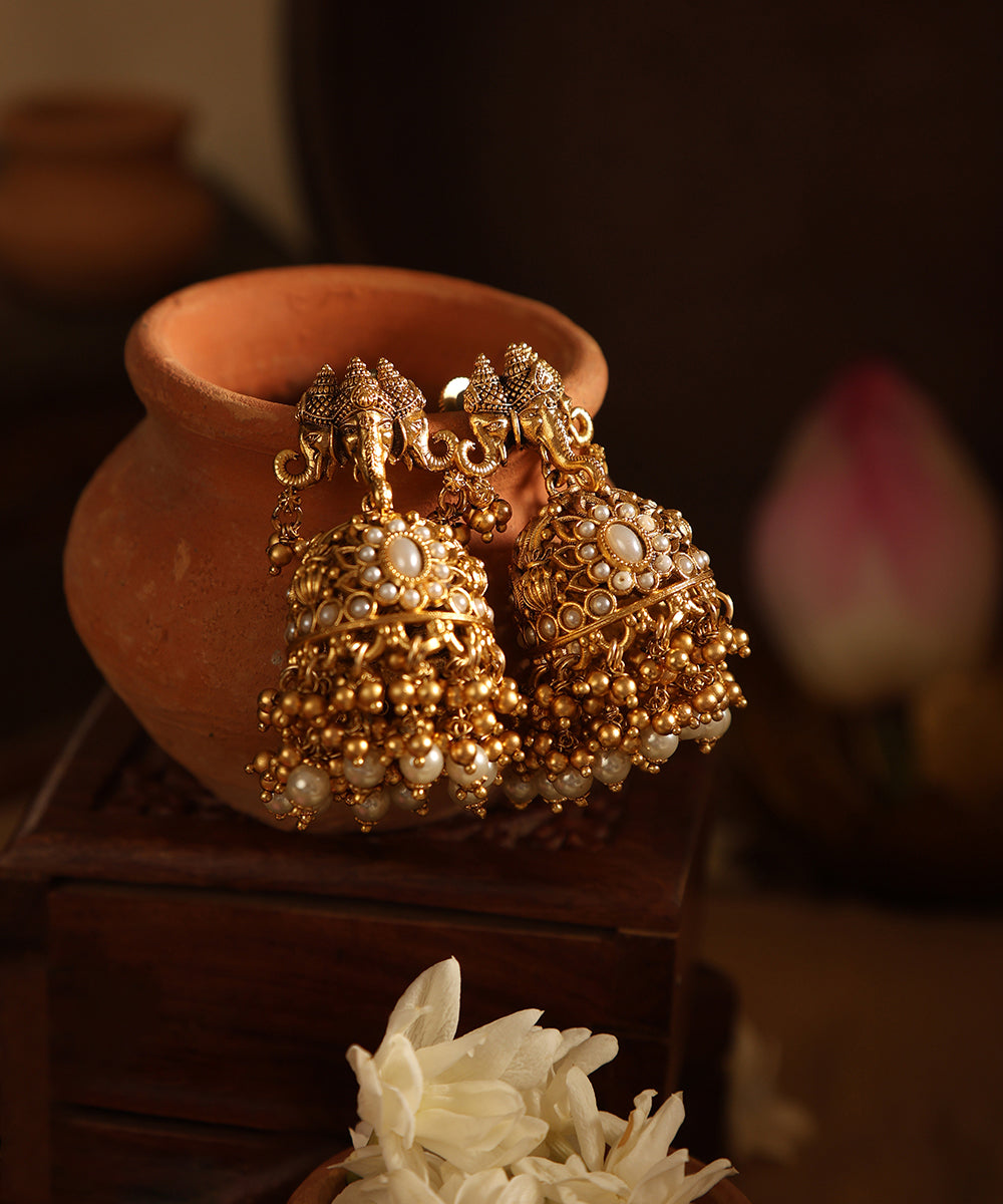 Dinis_Handcrafted_Jhumkas_With_Pearls_WeaverStory_01