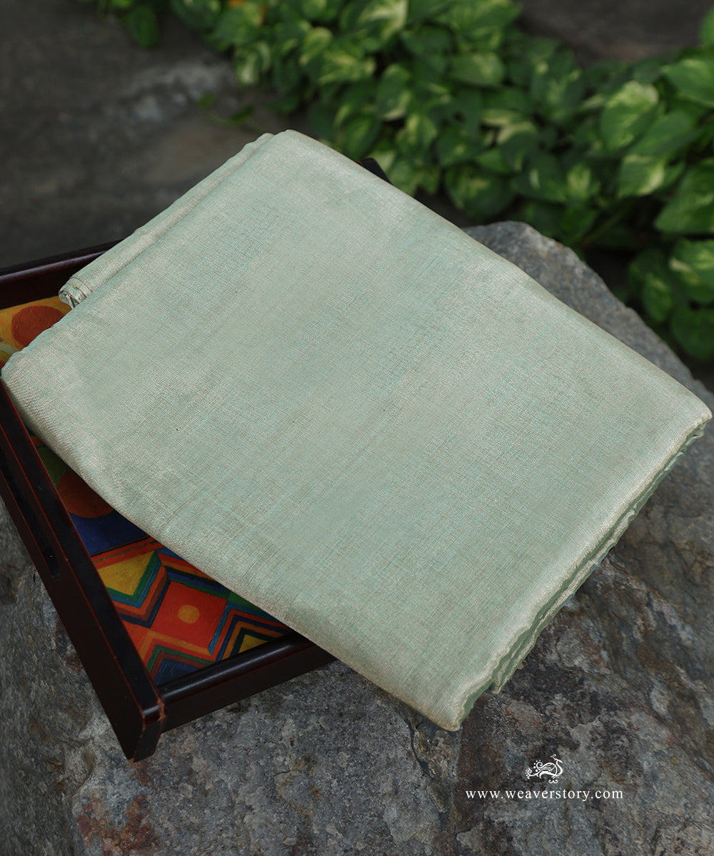 Silver_And_Green_Handloom_Plain_Pure_Tissue_Chanderi_Fabric_WeaverStory_01