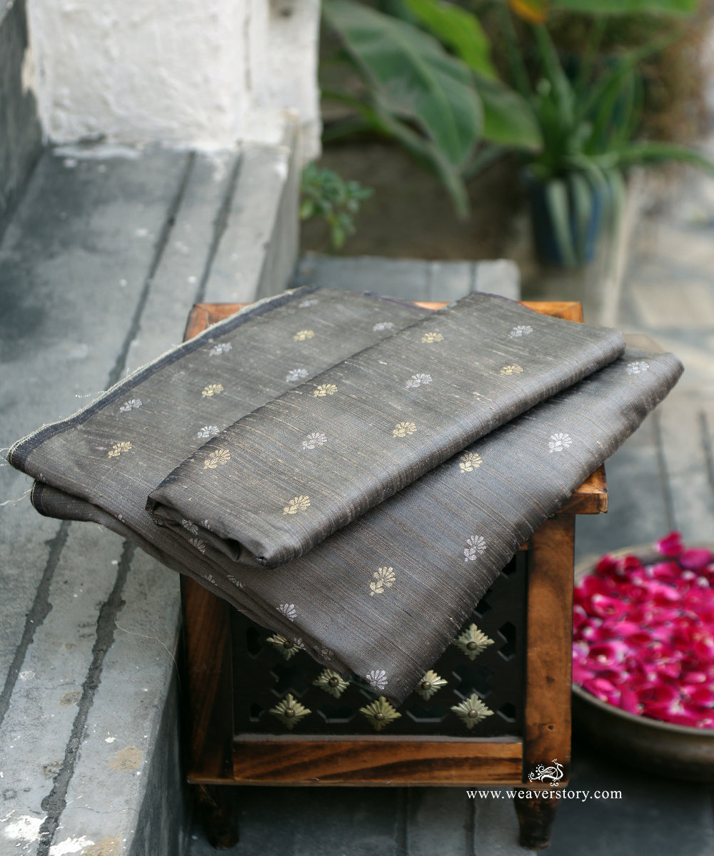 Handloom_Grey_Raw_Silk_Banarasi_Fabric_With_Small_Gold_And_Silver_Zari_Booti_WeaverStory_01