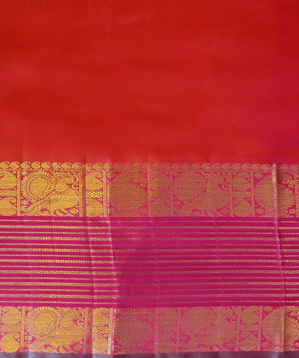 Bottle Green Plain Handloom Pure Silk Kanjivaram Saree With Annapakshi Motifs On Peach Pink Border