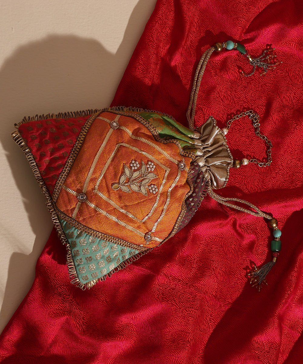 Multicoloured Brocade Potli With 4 Corner Brocade And Woven Bootas
