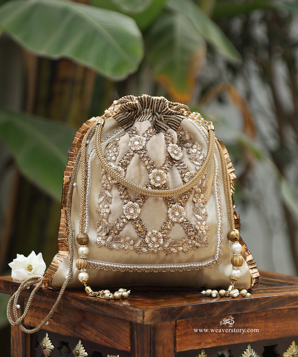 Beige_Tissue_Potli_With_Embroidery_And_Floral_Motif_WeaverStory_01