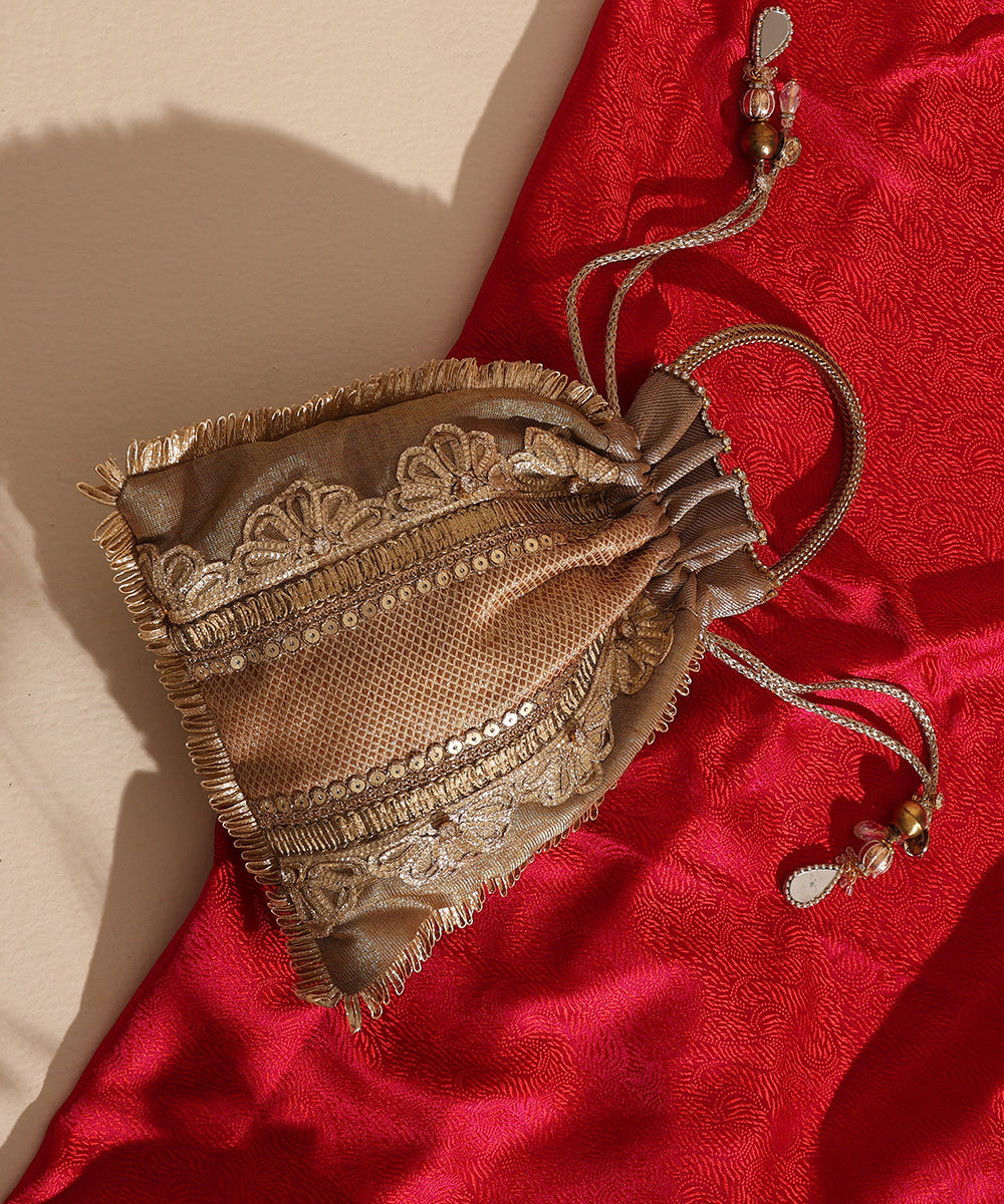 Beige Brocade Potli With Vertical Lace Stones And 3 Gold Panels