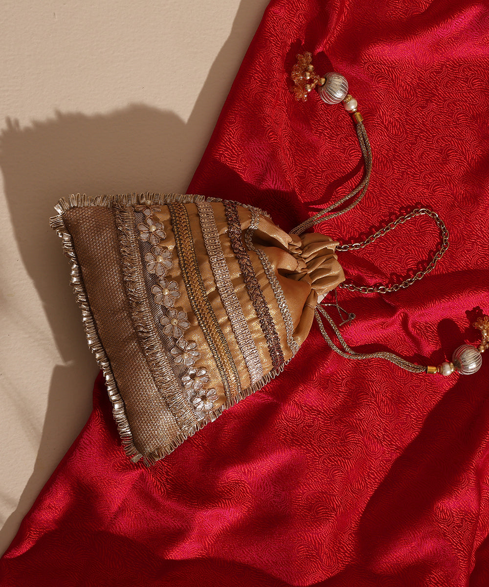 Beige-Golden Lame And Brocade Potli With Golden Laces