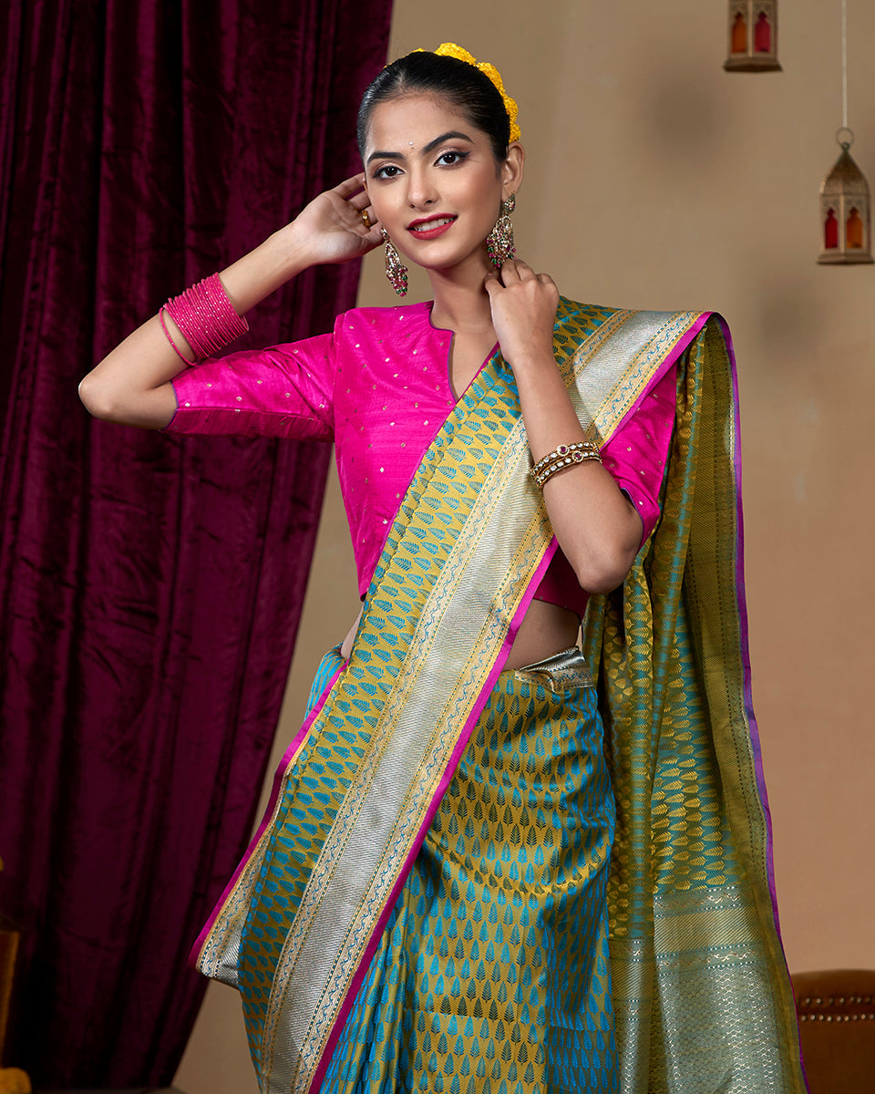 Light Green Handloom Pure Katan Silk Tanchoi Banarasi Saree With Teal Leaf Motifs