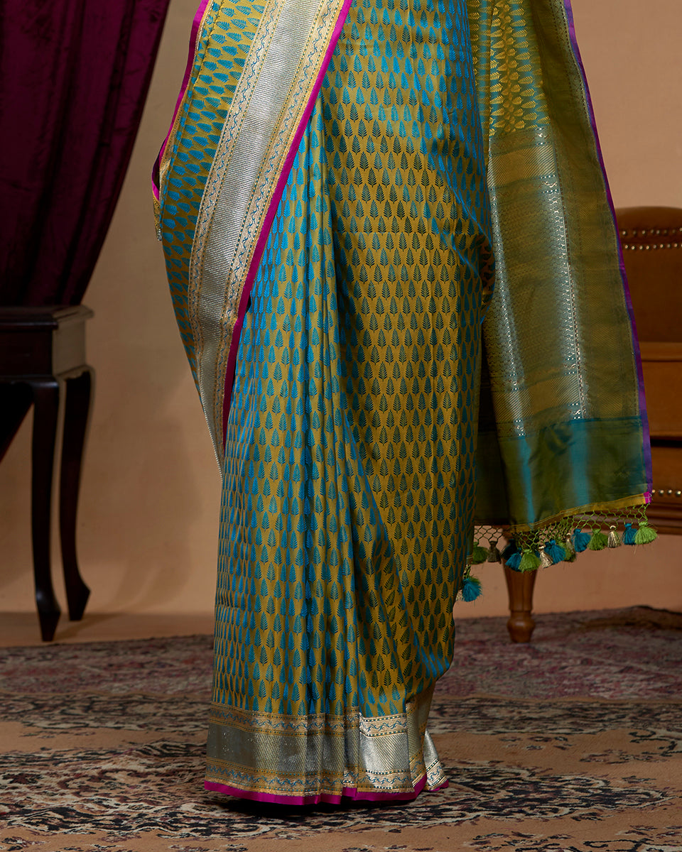 Light Green Handloom  Pure Katan Silk Tanchoi Banarasi Saree With Teal Green Leaf Motifs